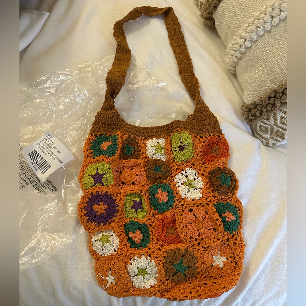 Crouched woven hobo bag